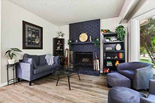 3472 Eldridge Avenue, Winnipeg, MB - Indoor Photo Showing Living Room With Fireplace