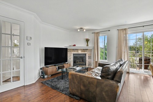 Salon - 5-620 Rue Proulx, Mont-Tremblant, QC - Indoor Photo Showing Living Room With Fireplace