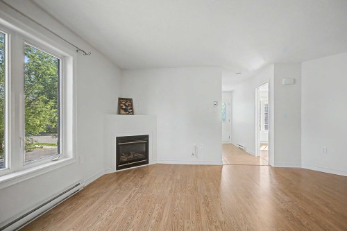 Salon - 2-20 Rue Du Conservatoire, Gatineau (Aylmer), QC - Indoor Photo Showing Living Room With Fireplace
