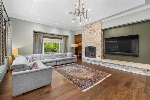 53 Harvard Ave, Winnipeg, MB - Indoor Photo Showing Living Room With Fireplace