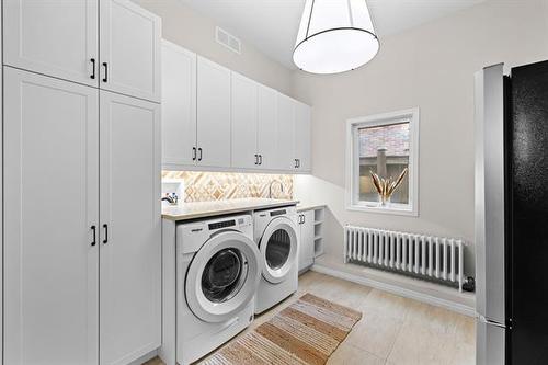 53 Harvard Ave, Winnipeg, MB - Indoor Photo Showing Laundry Room