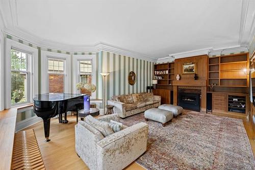 53 Harvard Ave, Winnipeg, MB - Indoor Photo Showing Living Room With Fireplace