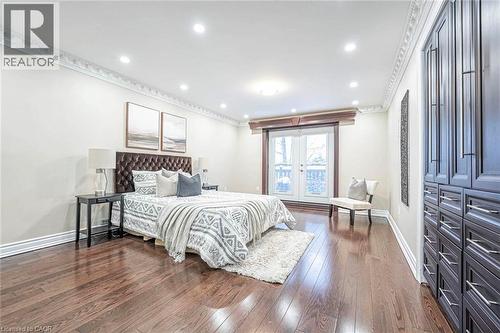 Bedroom featuring dark wood-finish flooring, recessed lighting, and crown molding - 247 Sand Road, Holland Landing, ON - Indoor Photo Showing Bedroom