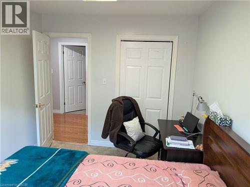 Neutral wall color with white trim - 45 Caswell Drive Unit# Upper, Hamilton, ON - Indoor Photo Showing Bedroom