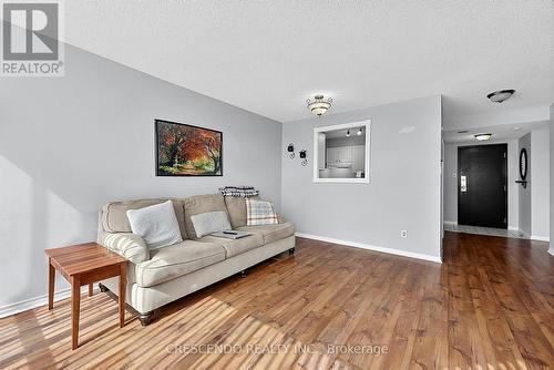 201 - 100 Millside Drive, Milton, ON - Indoor Photo Showing Living Room
