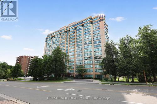 201 - 100 Millside Drive, Milton, ON - Outdoor With Facade