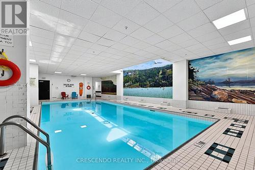 201 - 100 Millside Drive, Milton, ON - Indoor Photo Showing Other Room With In Ground Pool