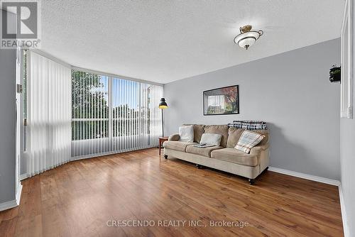 201 - 100 Millside Drive, Milton, ON - Indoor Photo Showing Living Room