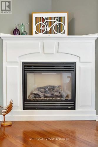 12 Aletha Drive, Prince Edward County (Wellington), ON - Indoor With Fireplace