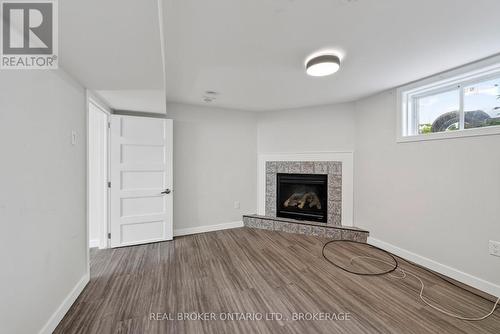 48 Bryden Avenue, Cornwall, ON - Indoor Photo Showing Living Room With Fireplace