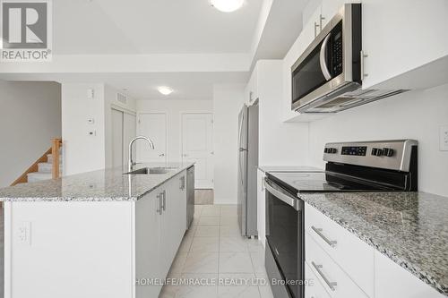 20 - 30 Liben Way, Toronto, ON - Indoor Photo Showing Kitchen With Upgraded Kitchen