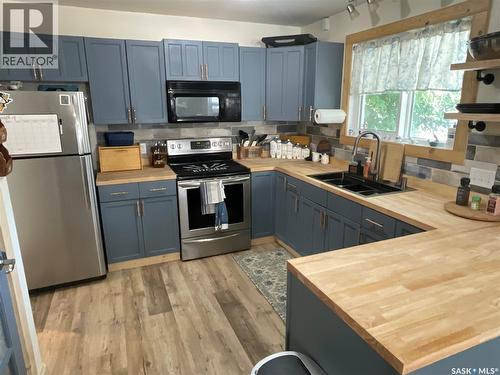 2018 8Th Street, Rosthern, SK - Indoor Photo Showing Kitchen With Double Sink