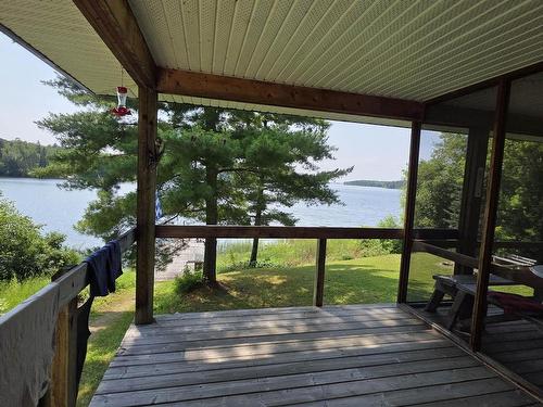 2 Moore Bay, Kenora, ON - Outdoor With Body Of Water With Deck Patio Veranda