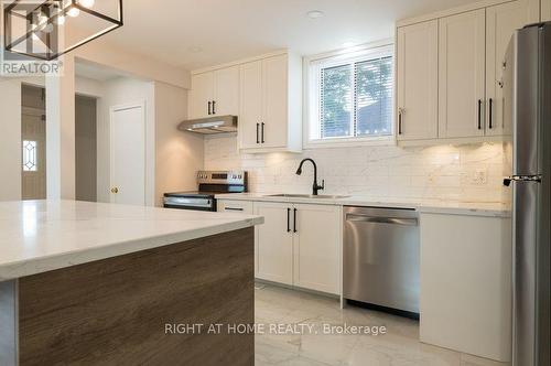 MAIN HOUSE - 6 BELLVARE CRESCENT , Toronto, Ontario M1R 2M9 3