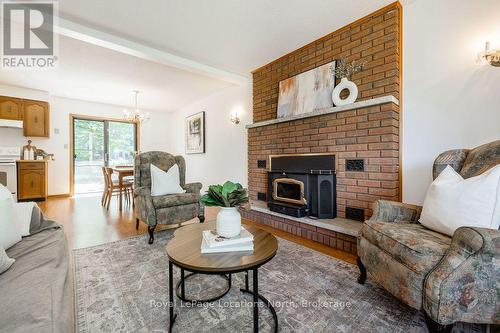 1928 Champlain Road, Tiny, ON - Indoor Photo Showing Living Room With Fireplace