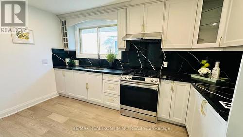UPPER - 65 HEASLIP TERRACE , Toronto, Ontario M1T 1W8 2
