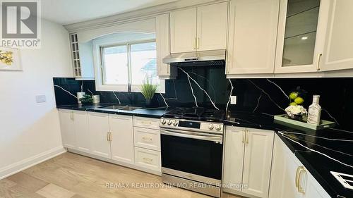 UPPER - 65 HEASLIP TERRACE , Toronto, Ontario M1T 1W8 3