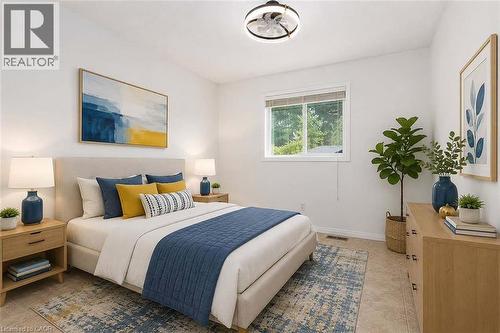 Recessed window with blinds, overhead ceiling fan light fixture, light-toned flooring, and white walls - 47 Queensway Drive, Strathroy, ON - Indoor Photo Showing Bedroom