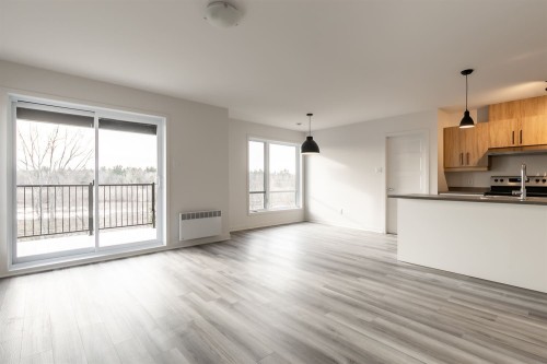 Living Room - 306-300 Rue Du Grenoble, Lachute, QC - Indoor Photo Showing Kitchen
