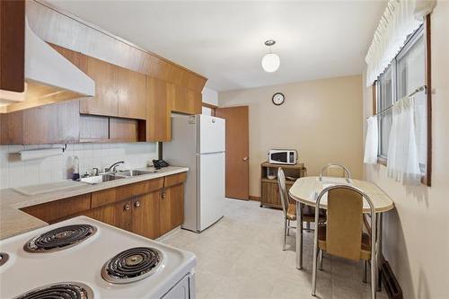 30 Woodcrest Dr, Winnipeg, MB - Indoor Photo Showing Kitchen With Double Sink