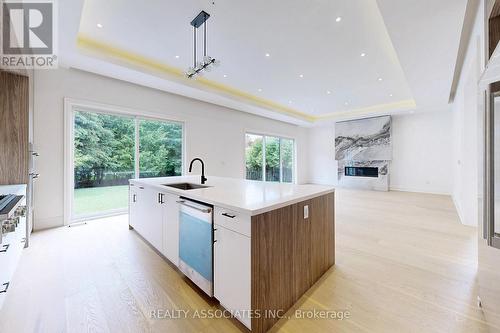 32 Cossar Avenue, Aurora, ON - Indoor Photo Showing Kitchen With Fireplace