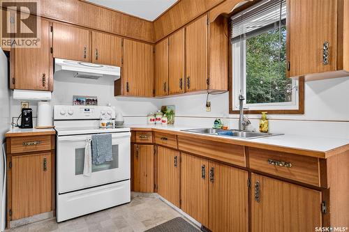 919 Holdsworth Crescent, Moose Jaw, SK - Indoor Photo Showing Kitchen With Double Sink