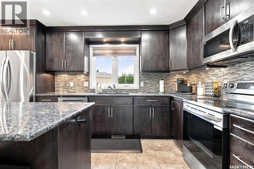 242 Auld Crescent, Saskatoon, SK - Indoor Photo Showing Kitchen With Upgraded Kitchen
