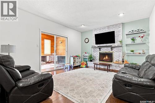 242 Auld Crescent, Saskatoon, SK - Indoor Photo Showing Living Room With Fireplace