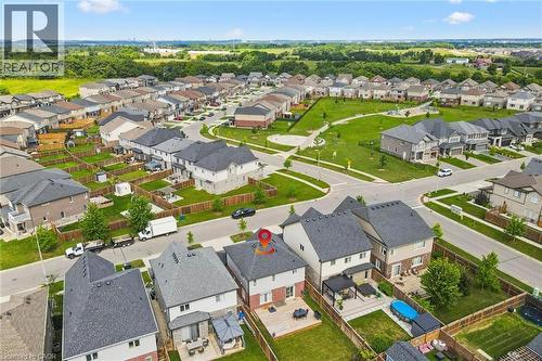 Expansive neighborhood setting with numerous detached properties, green spaces, and paved streets - 360 Freure Drive, Cambridge, ON - Outdoor With View