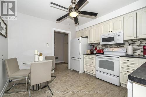 Bright & Spacious White Kitchen w/ Picture Windo - 655 Dodsworth Crescent, Mississauga, ON - Indoor Photo Showing Kitchen