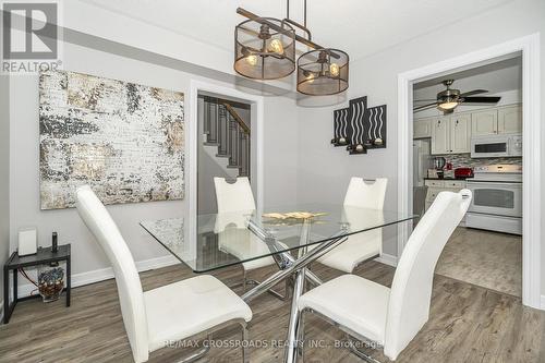 Custom Lighting & Laminate Flooring - 655 Dodsworth Crescent, Mississauga, ON - Indoor Photo Showing Dining Room
