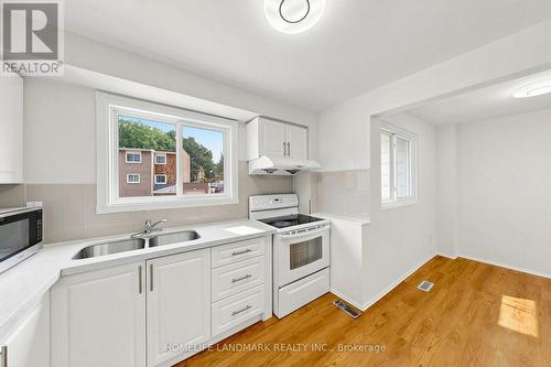 8 Rusty Crest Way, Toronto, ON - Indoor Photo Showing Kitchen With Double Sink