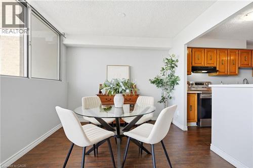 Wood-finish flooring throughout - 375 King Street N Unit# 708, Waterloo, ON - Indoor Photo Showing Dining Room