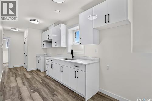 1211 Nightingale Terrace, Saskatoon, SK - Indoor Photo Showing Kitchen With Double Sink