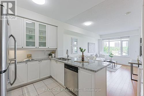 214 - 111 Upper Duke Crescent, Markham, ON - Indoor Photo Showing Kitchen With Stainless Steel Kitchen With Double Sink