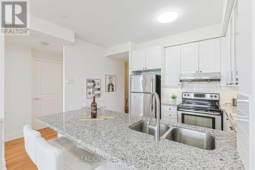 214 - 111 Upper Duke Crescent, Markham, ON - Indoor Photo Showing Kitchen With Stainless Steel Kitchen With Double Sink With Upgraded Kitchen