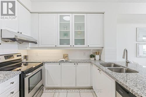 214 - 111 Upper Duke Crescent, Markham, ON - Indoor Photo Showing Kitchen With Stainless Steel Kitchen With Double Sink With Upgraded Kitchen
