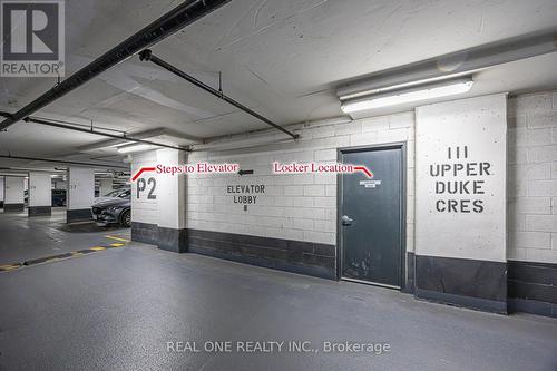 214 - 111 Upper Duke Crescent, Markham, ON - Indoor Photo Showing Garage