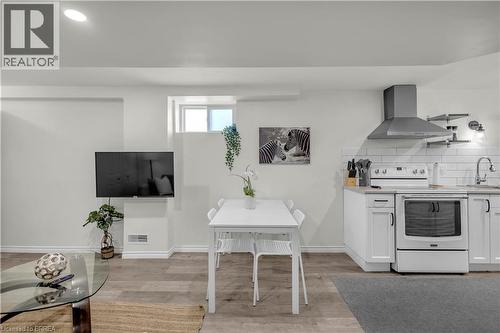 Open-concept living area with wood-finish flooring - 450 Highland Road E, Kitchener, ON - Indoor
