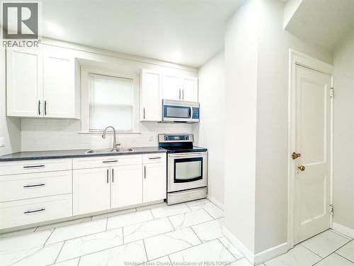 1111 Elsmere, Windsor, ON - Indoor Photo Showing Kitchen With Double Sink