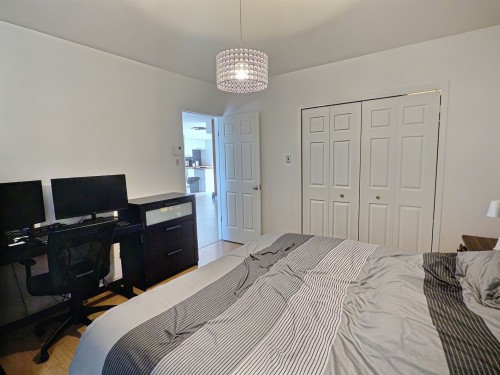 Chambre à coucher principale - 1895 Rue St-Denis, Val-D'Or, QC - Indoor Photo Showing Bedroom