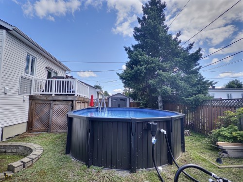 Cour - 1895 Rue St-Denis, Val-D'Or, QC - Outdoor With Above Ground Pool