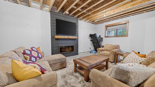 3373 Mountain View Court, Jaffray, BC - Indoor Photo Showing Living Room With Fireplace