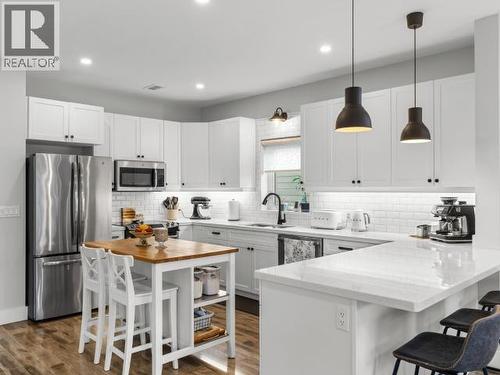 26 Iskoot Crescent, Whitehorse, YT - Indoor Photo Showing Kitchen With Upgraded Kitchen