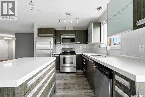 114 1610 Dakota Drive, Regina, SK - Indoor Photo Showing Kitchen With Stainless Steel Kitchen With Double Sink With Upgraded Kitchen