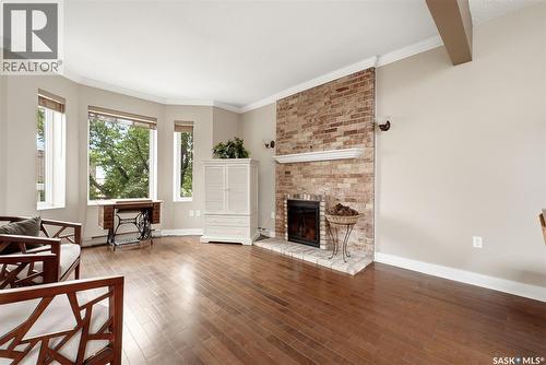 305 2925 14Th Avenue, Regina, SK - Indoor Photo Showing Living Room With Fireplace