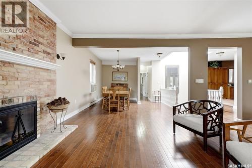 305 2925 14Th Avenue, Regina, SK - Indoor Photo Showing Living Room With Fireplace