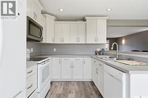 275 Wyant Lane, Saskatoon, SK - Indoor Photo Showing Kitchen With Double Sink