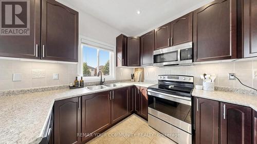 51 Shuttleworth Drive, Clarington, ON - Indoor Photo Showing Kitchen With Double Sink