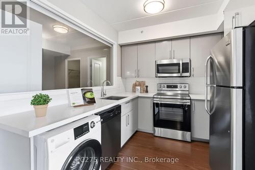 Virtually Staged - 218 - 1291 Gordon Street, Guelph (Kortright West), ON - Indoor Photo Showing Kitchen With Stainless Steel Kitchen